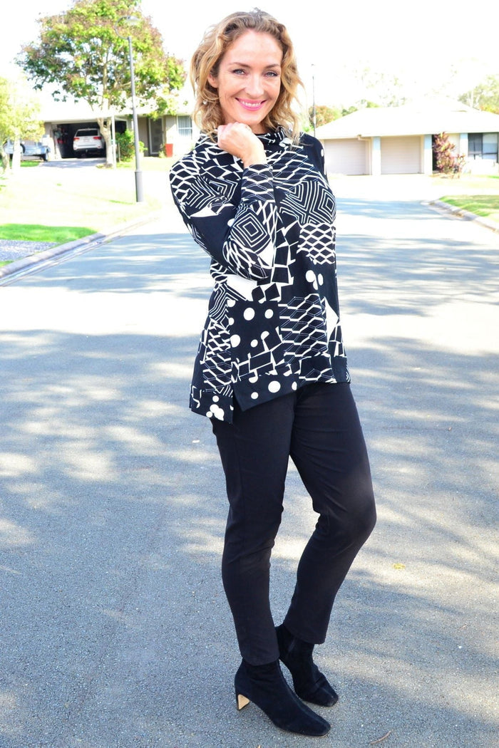 Wishstone Dotty Do Little long sleeve fleece tunic top with a cozy, patterned design and a relaxed fit.