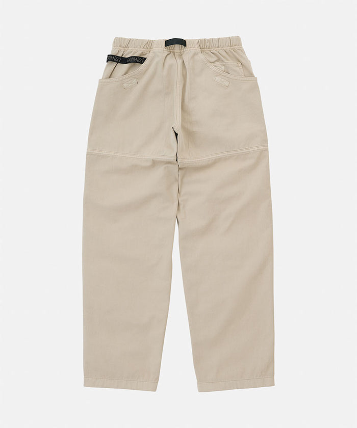 Back view of sand pigment Gramicci EQT Pant on a light-tone background.