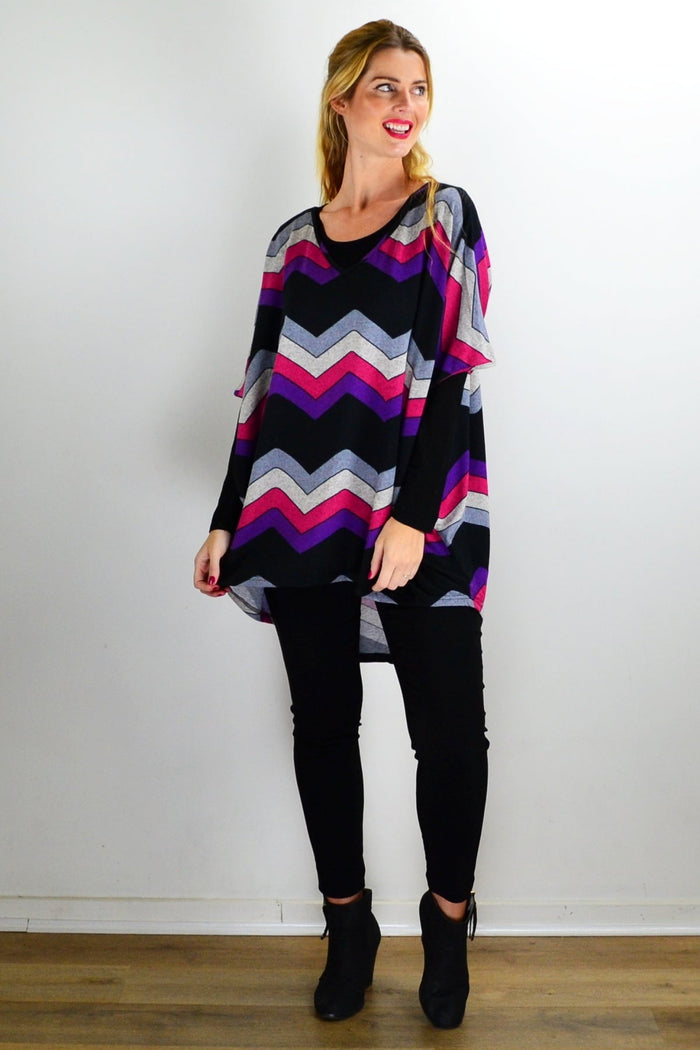 Fabulous Fleece Zig Zag knit tunic top by La Mode, featuring a colorful zig zag pattern and cozy fleece fabric.