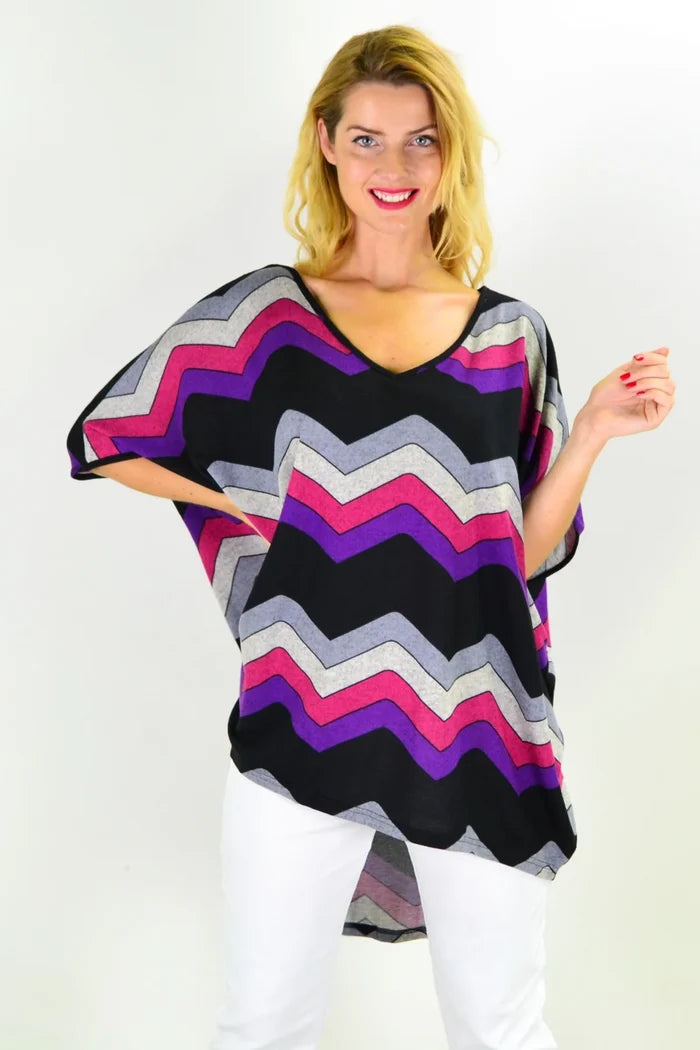 La Mode Fabulous Fleece Zig Zag knit tunic top featuring a colorful zig zag pattern and cozy fleece fabric.
