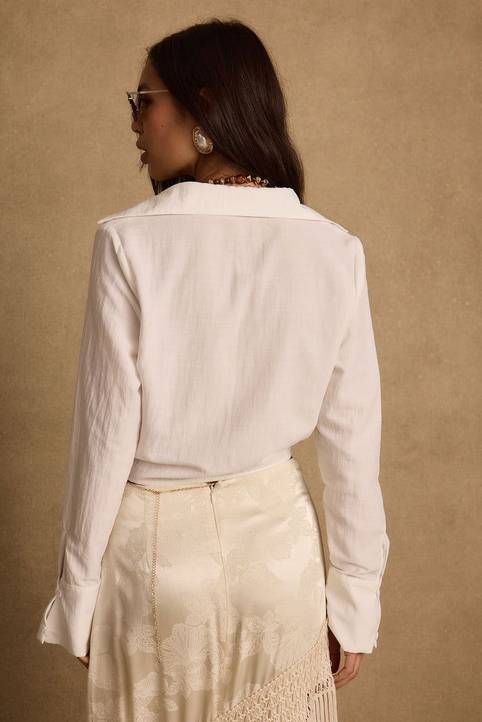 Frankie Cream Satin Jacquard Fringe Midi Skirt paired with complementary accessories for a polished look.