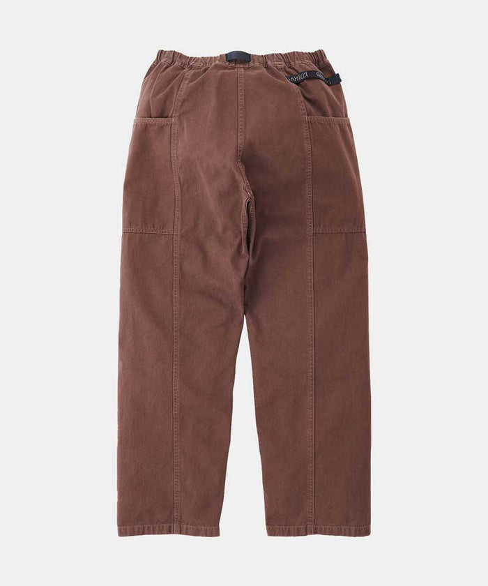 Back view of tobacco Gramicci Gadget Pant on a light-tone background.