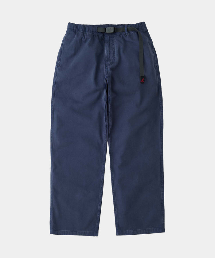 Navy pigment colored Gramicci Pant Straight Fit with a belt against a light-tone background.
