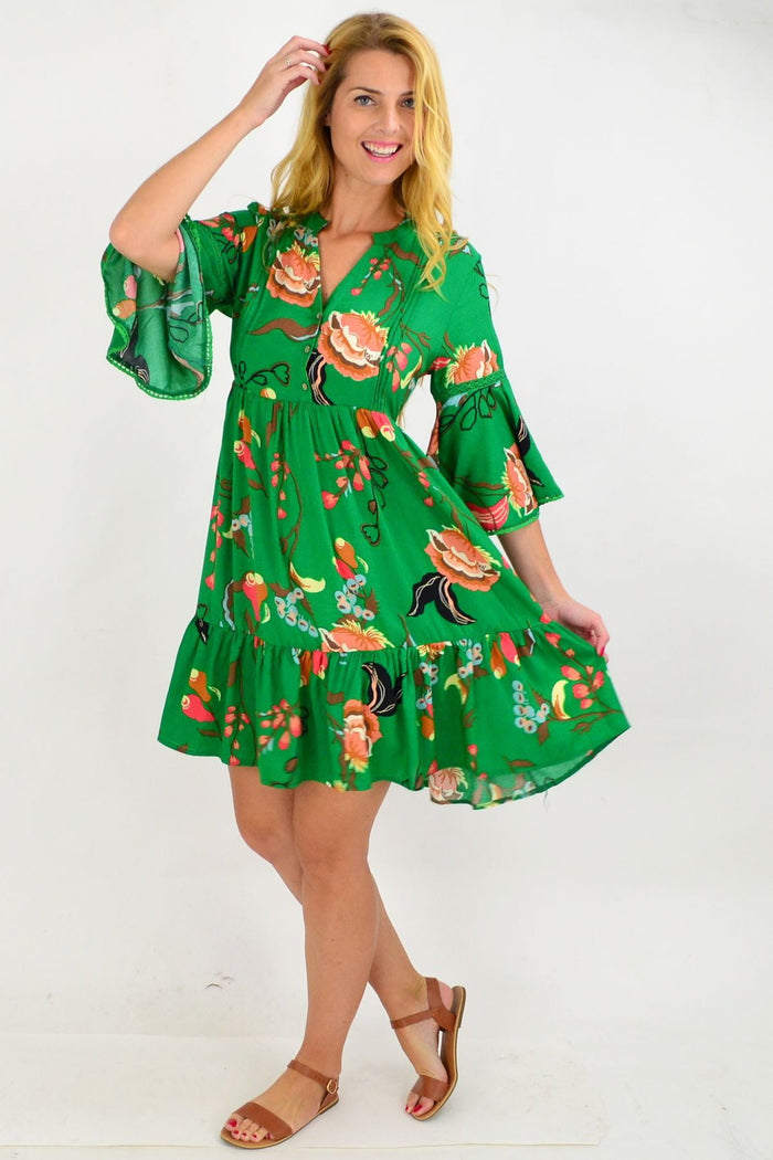 Willow Tree green Betty bell sleeve tunic dress displayed on a hanger with a flowy, casual design and bell sleeves.
