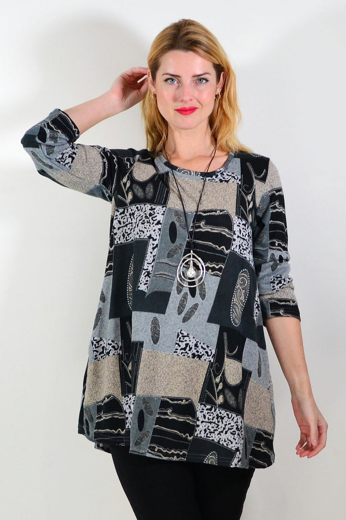 Grey abstract print fleece tunic top by Hourglass, showing a cozy, stylish long-sleeve tunic with abstract pattern and soft fleece fabric.