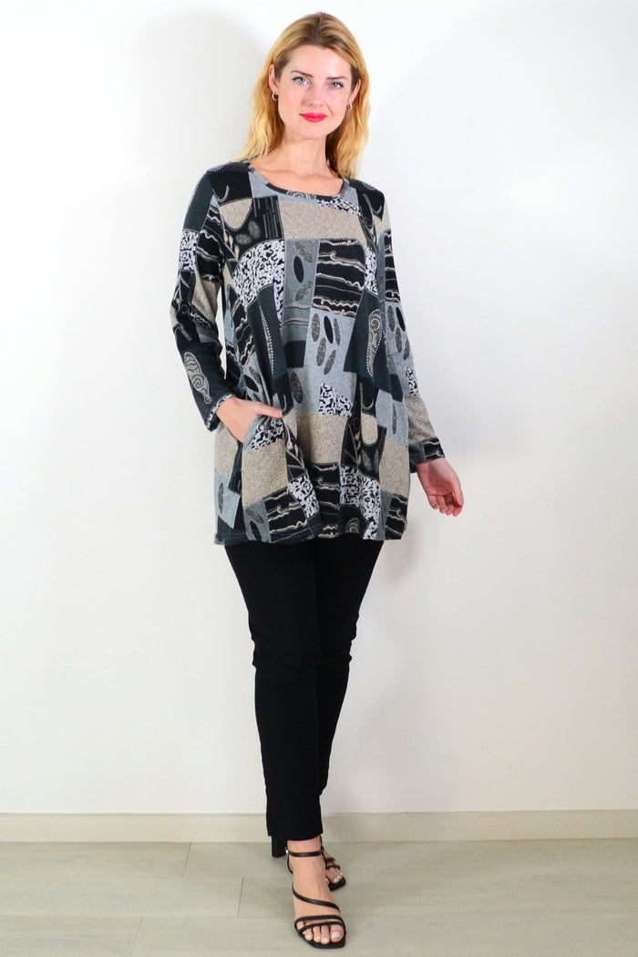 Grey abstract print fleece tunic top by Hourglass, featuring a cozy, stylish design with a relaxed fit and artistic pattern.
