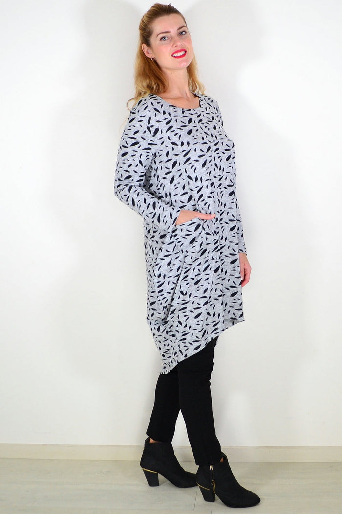 Grey floating leaf knit tunic top by I Love Tunics, featuring a relaxed fit and leaf pattern, displayed on a hanger.
