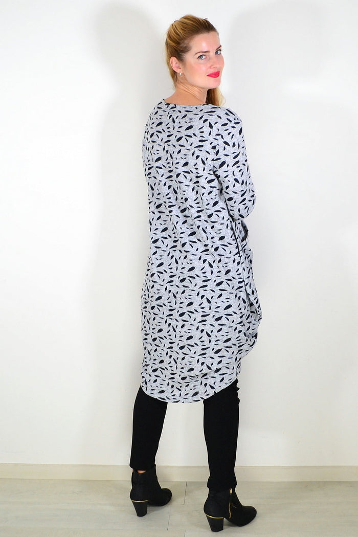 Grey floating leaf knit tunic top from I Love Tunics, featuring a relaxed fit and leaf pattern, displayed on a hanger.