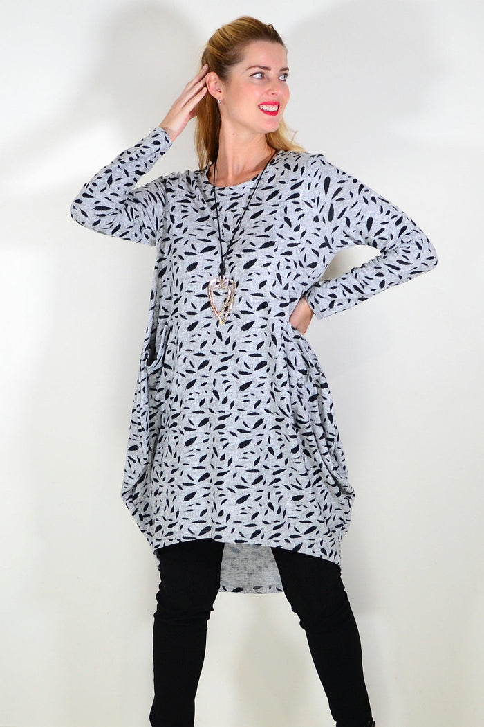 Grey floating leaf knit tunic top from I Love Tunics, shown on a hanger with a relaxed fit and textured fabric.