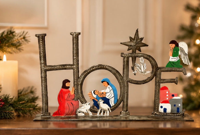 Haitian metal art hope nativity brushed steel painted — wholesale church gift shop faith retailer fair trade