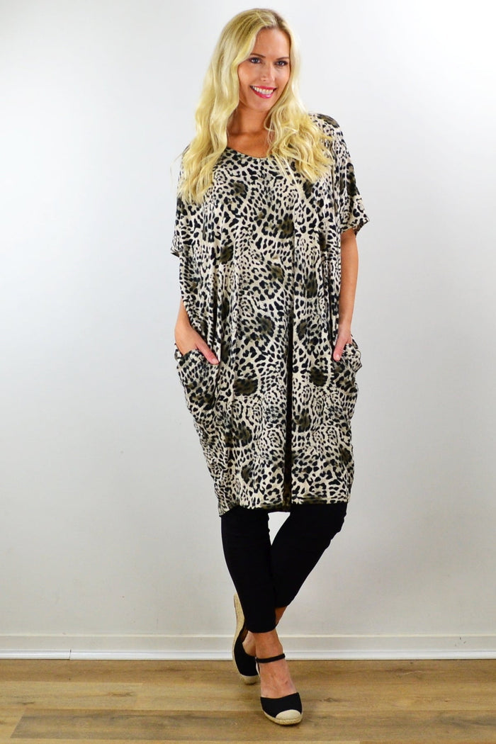 Willow Tree leopard print relaxed tunic dress laid flat, showcasing soft fabric and stylish animal print design.