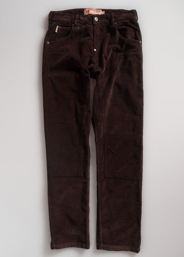 Dark brown corduroy pants with front pockets and belt loops, laid flat on a light background, showcasing classic casual style.