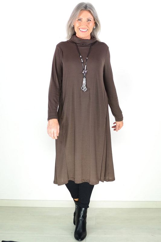 Long brown Hourglass Avalon tunic with a roll neck, featuring a relaxed fit and soft fabric, styled for casual or layered looks.