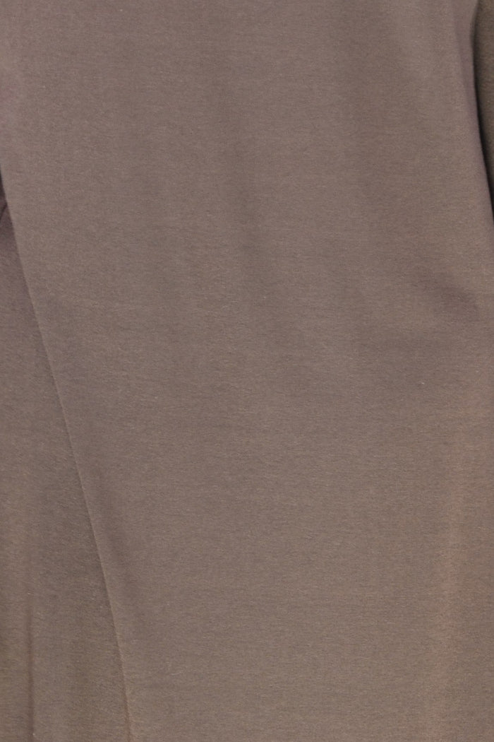 Long brown Hourglass Avalon tunic with a roll neck, featuring a relaxed fit and soft fabric, styled against a neutral background.
