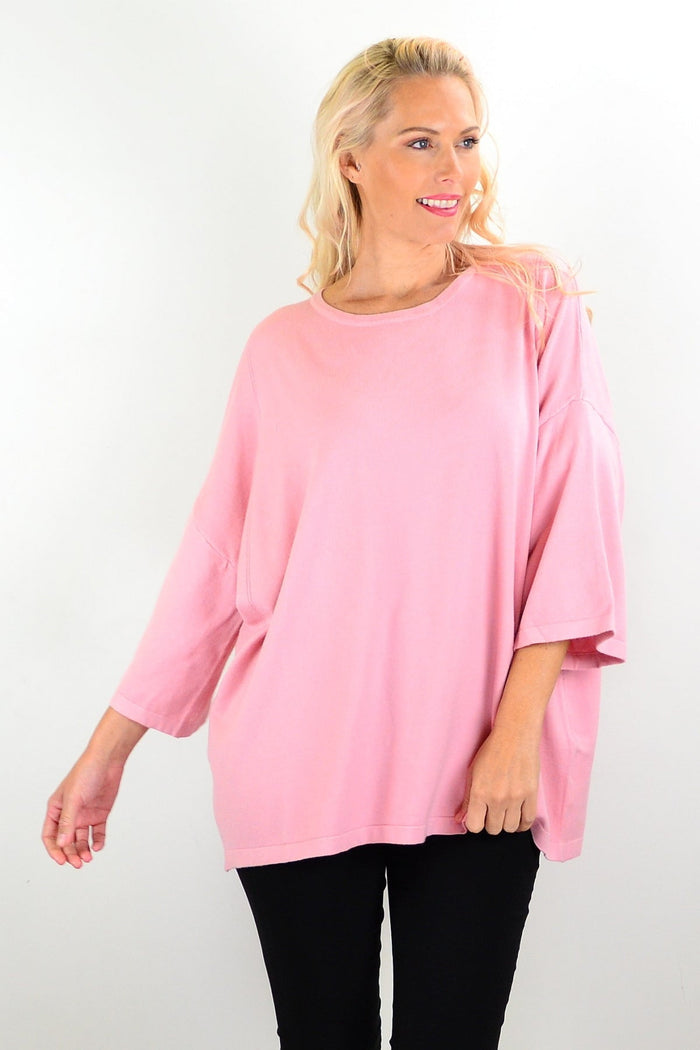 Cali&Co lush pink Debs double sleeve tunic jumper displayed on a hanger with a close-up of fabric details.