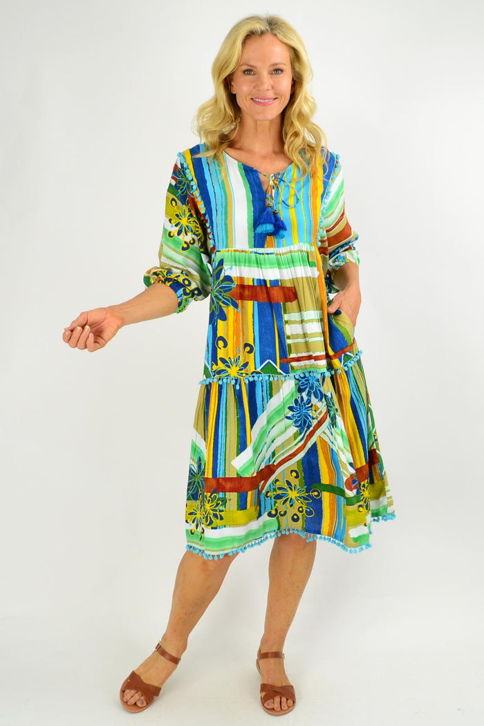 Orientique Malaga Midi Boho Tunic Dress featuring a flowy, patterned fabric with a relaxed fit and bohemian style.