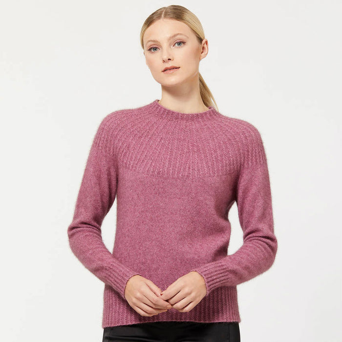 Model wearing Yoke neck cable jersey in colour Heather