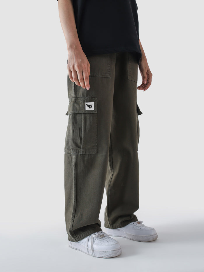 Military green cargo pants detail shot cargo pockets 100% cotton Pakistan – GROOVY