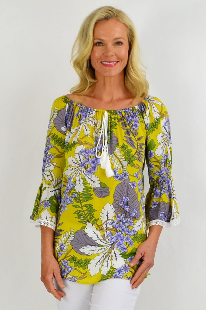 Mustard tropical tassel off-shoulder tunic top with floral print from Missy Q, perfect for summer beachwear or casual outings.