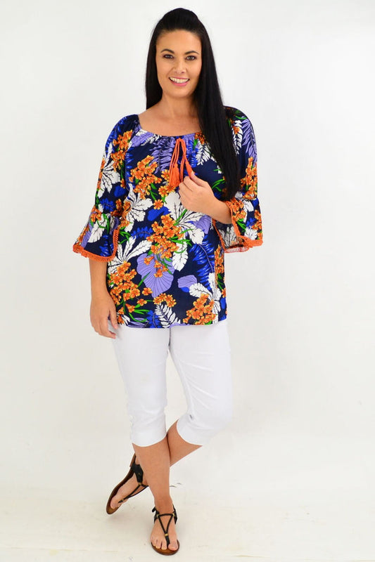 Colorful navy orange tropical off-shoulder tunic top by Missy Q, featuring vibrant floral patterns and relaxed fit.