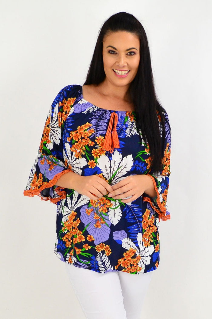 Navy orange tropical off-shoulder tunic top from Missy Q, featuring vibrant floral print and lightweight fabric.