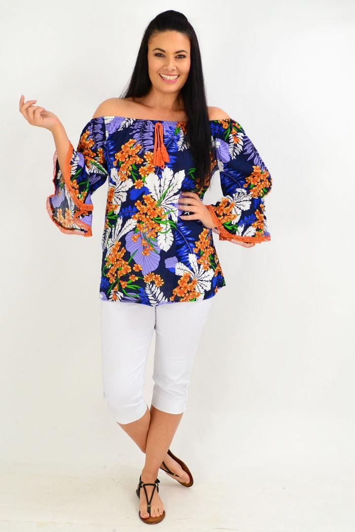 Navy and orange tropical off-shoulder tunic top by Missy Q featuring vibrant floral print and relaxed fit.