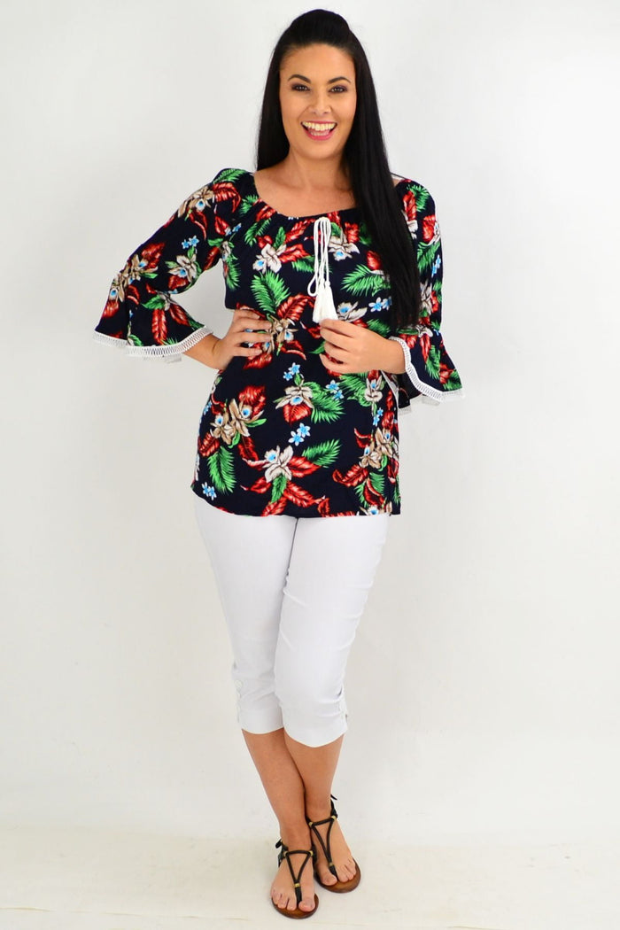 Navy tropical tassel off-shoulder tunic top with boho floral print, made of rayon, by Missy Q.