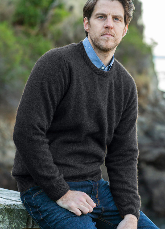 Man wearing the Noble Wilde - Merino & Possum Cambridge Crew Sweater (NW1001) in the colour Charcoal.