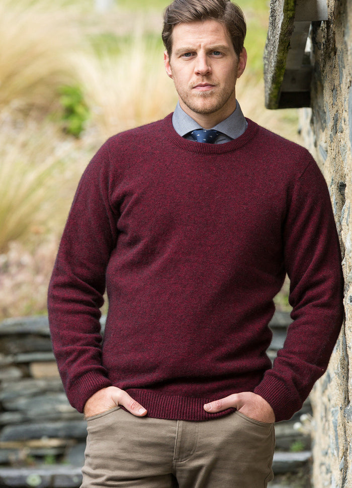 Man wearing the Noble Wilde - Merino & Possum Cambridge Crew Sweater (NW1001) in the colour Port.
