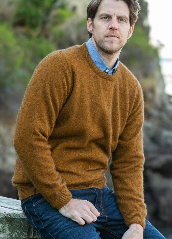 Man wearing the Noble Wilde - Merino & Possum Cambridge Crew Sweater (NW1001) in the colour Tahiti.