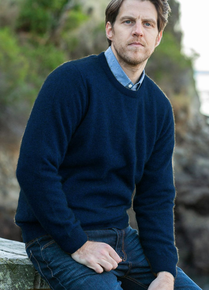 Man wearing the Noble Wilde - Merino & Possum Cambridge Crew Sweater (NW1001) in the colour Maritime.