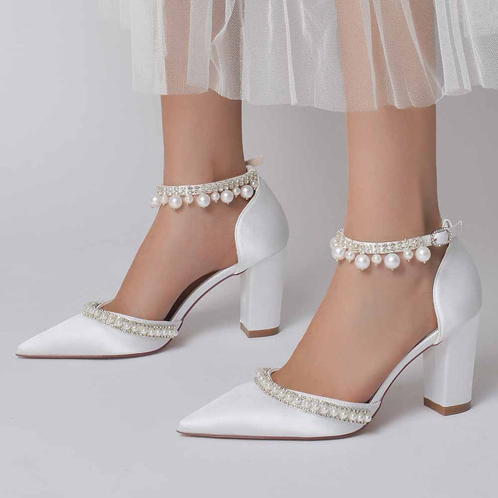 Elegant pearl embellished satin high heels with block heels and ankle strap detail