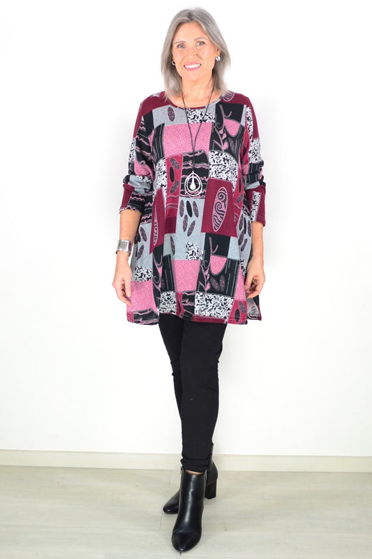 Pink abstract print fleece tunic top by Hourglass, featuring a cozy, stylish design with vibrant pattern and relaxed fit.