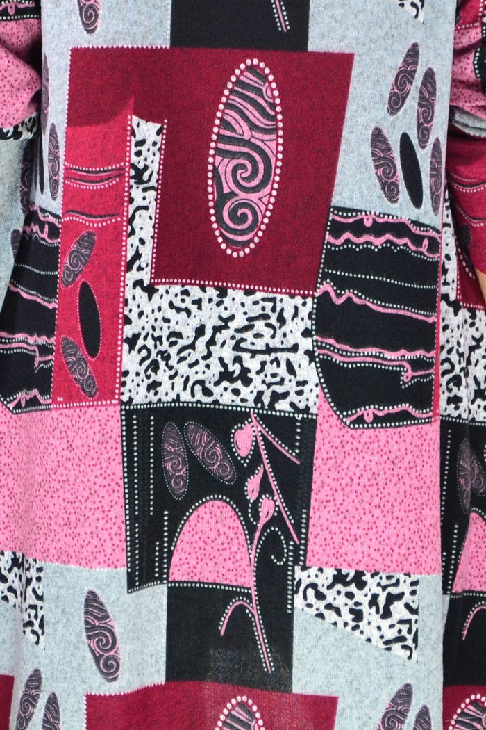 Pink abstract print fleece tunic top by Hourglass, featuring a cozy, flowing design with vibrant artistic patterns.