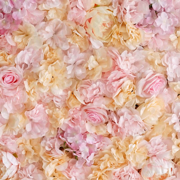Pink and cream artificial flowers in a lush floral arrangement. #whtbkgd