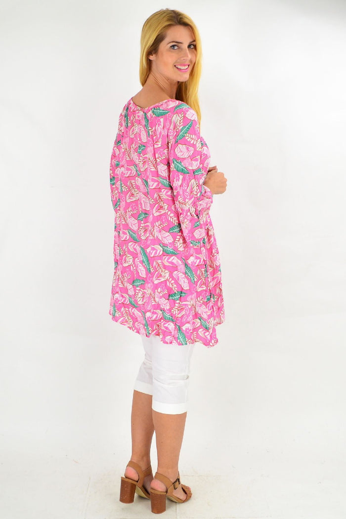 Pink floaty leaf crinkle tunic top by Hourglass, lightweight and soft summer blouse with a relaxed fit and leaf pattern.