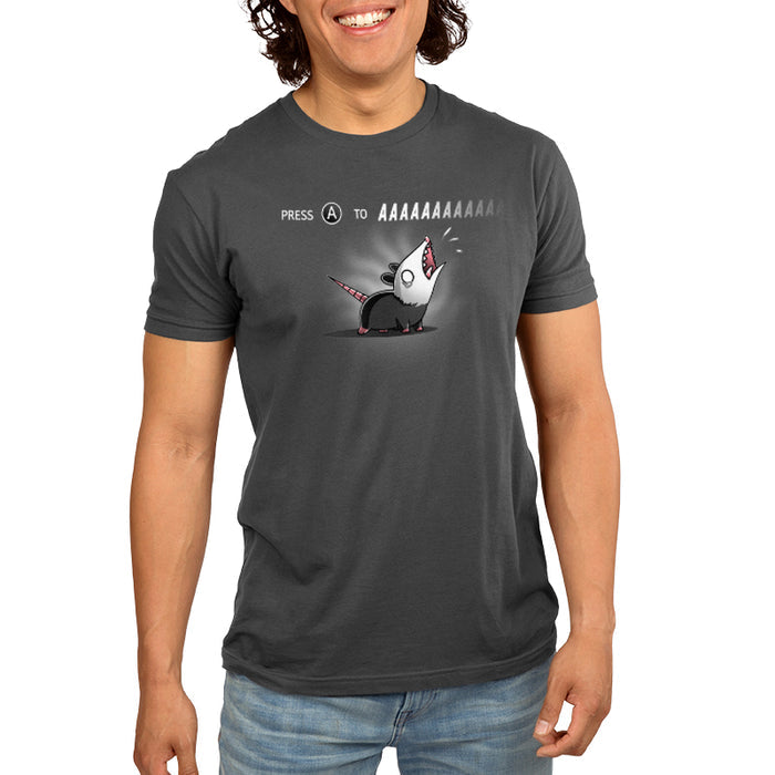 Premium Cotton T-shirt_TeeTurtle Press A to AAAAAAAA charcoal gray t-shirt featuring a cartoon opossum with the words "press to Press A to AAAAAAA" written above the opossum.