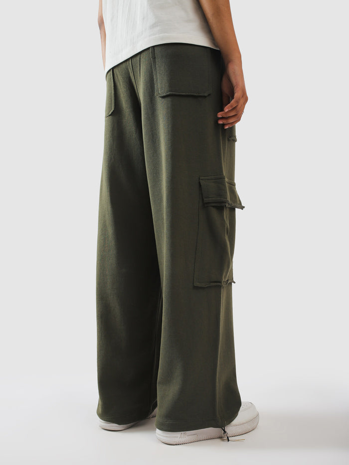 Back view of military green baggy cargo trousers - GROOVY Pakistan