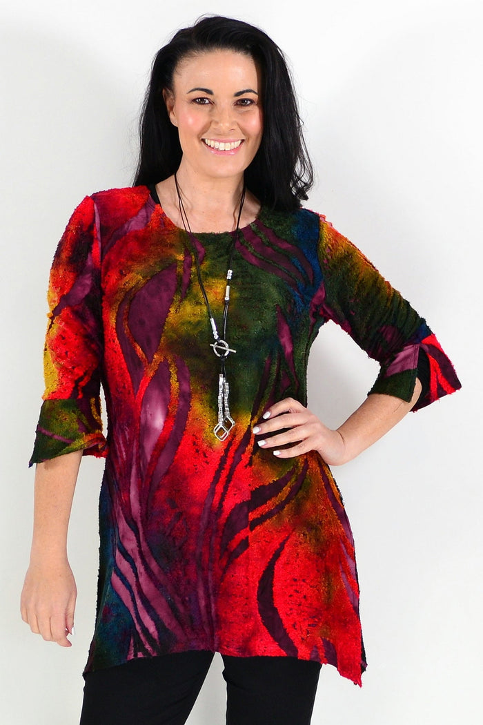 Colorful red forest print ladies tunic top by Whispers, featuring vibrant patterns and a comfortable fit.