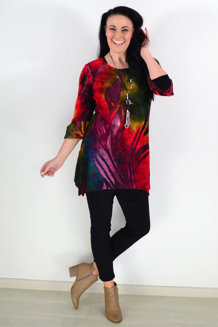 Colorful red forest patterned ladies tunic top by Whispers, featuring vibrant design and comfortable fit, perfect for casual wear.
