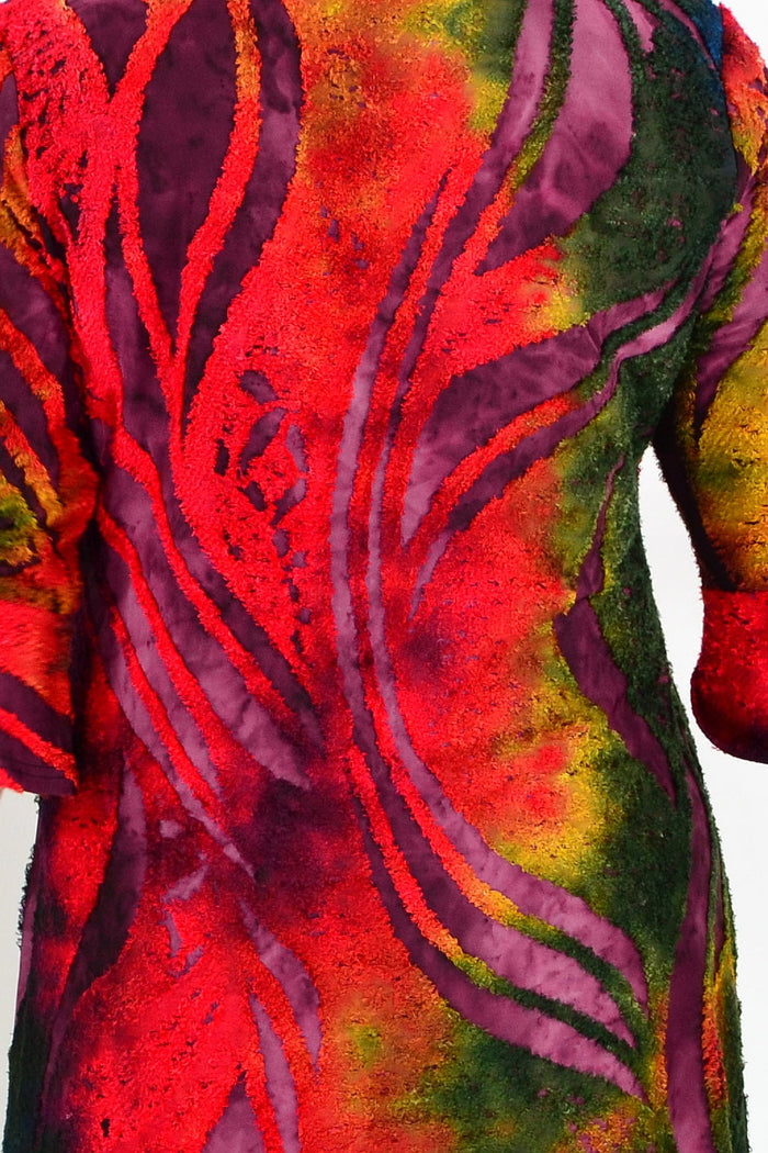 Colorful red forest print women's tunic top by Whispers, featuring a vibrant, flowy design with long sleeves and a relaxed fit.