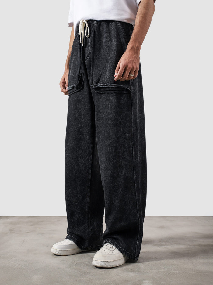 Reverse washed cargo pants male model back view wide leg washed streetwear Pakistan – GROOVY