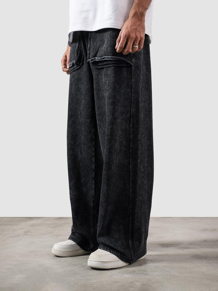 Reverse washed cargo pants male model side view full body Pakistan – GROOVY