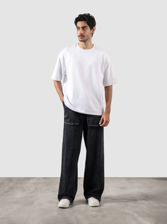 Reverse washed cargo pants male model full body front view washed black Pakistan – GROOVY