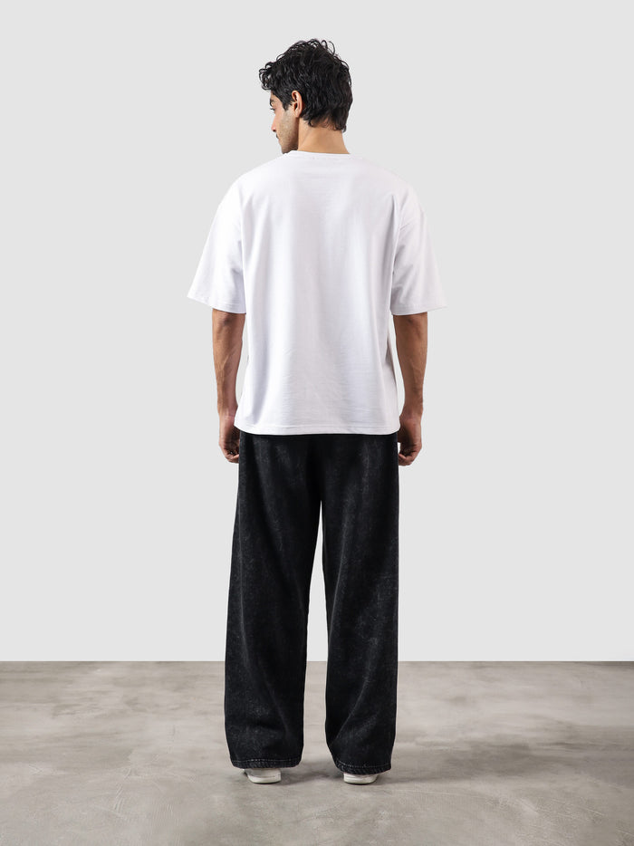 Reverse washed cargo pants couple lifestyle shot washed streetwear Pakistan – GROOVY