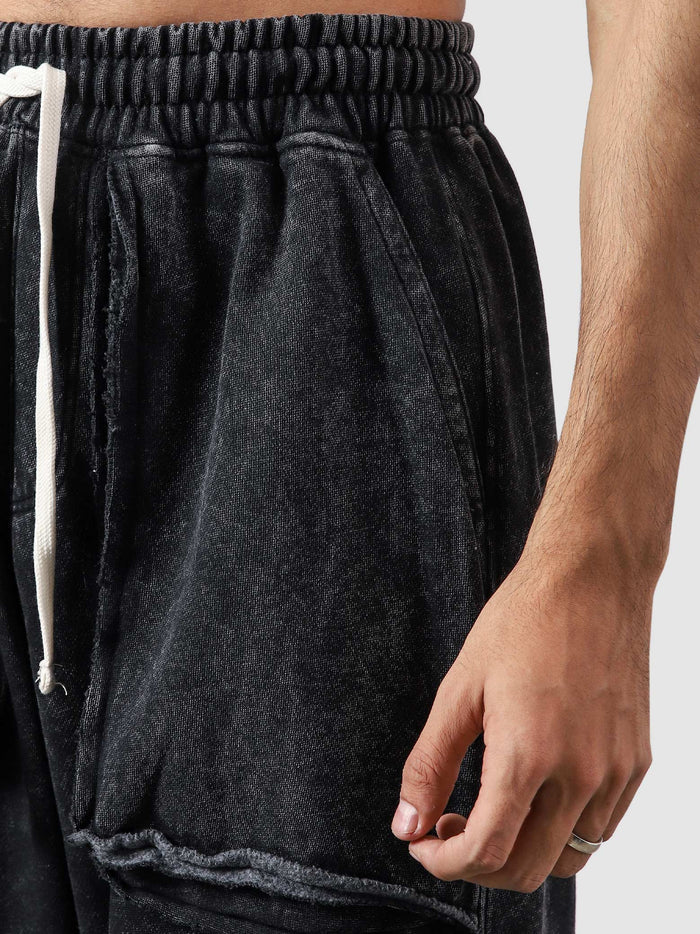 Reverse washed cargo pants flat lay washed black 330 GSM cotton Pakistan – GROOVY