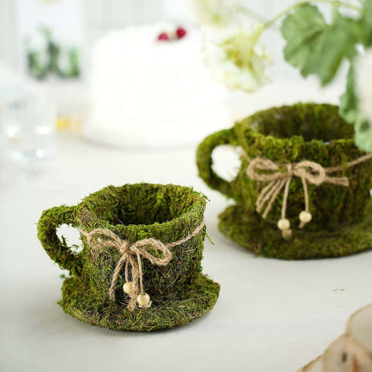 Moss-covered cups with twine and bead accents