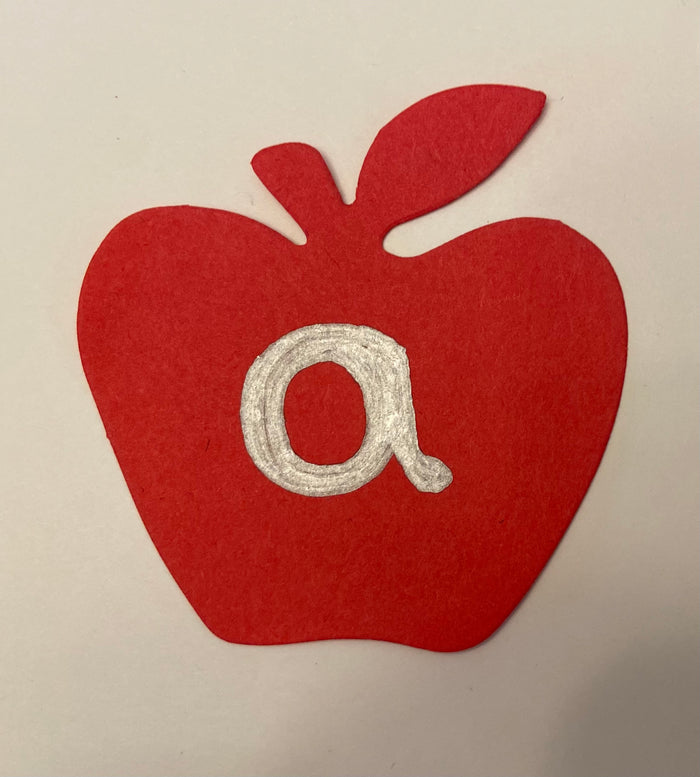 Red apple paper cut-outs for educational decor projects