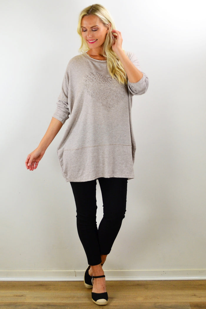 Taupe knit tunic top from Indigo Designs, straight fit with long sleeves and a relaxed style, shown on a hanger.