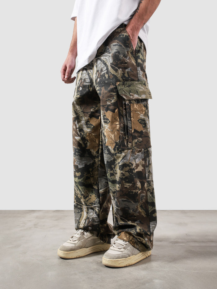 Tactical camo cargo pants male model side view full body utility Pakistan – GROOVY